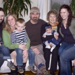 Twin Braylon, son Gabriel, his fiancee Chelsie, Twin Easton, Grandpa Tom Helma, Grandbaby Indila, Grandmother Kathy, daughter SarahGrace, and her husband, son-in-law Brian. (daughter Faith, son-in-law Jonathan, and grandson Waylon are not present).